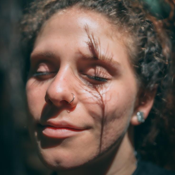 Kaveri Mehta, Lead Design Curator at Mosaic Fresh Harbor, reviewing corporate floral arrangements